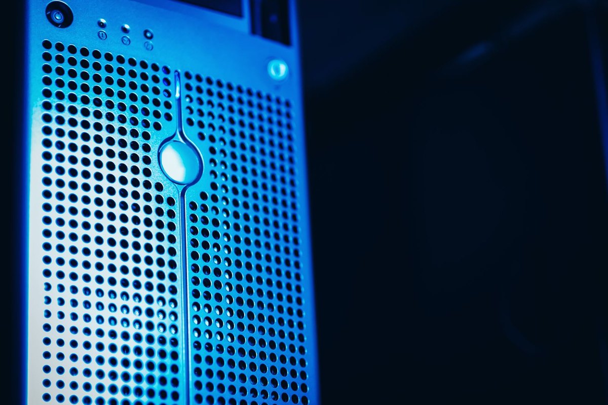 Blue-lit server rack in a data center