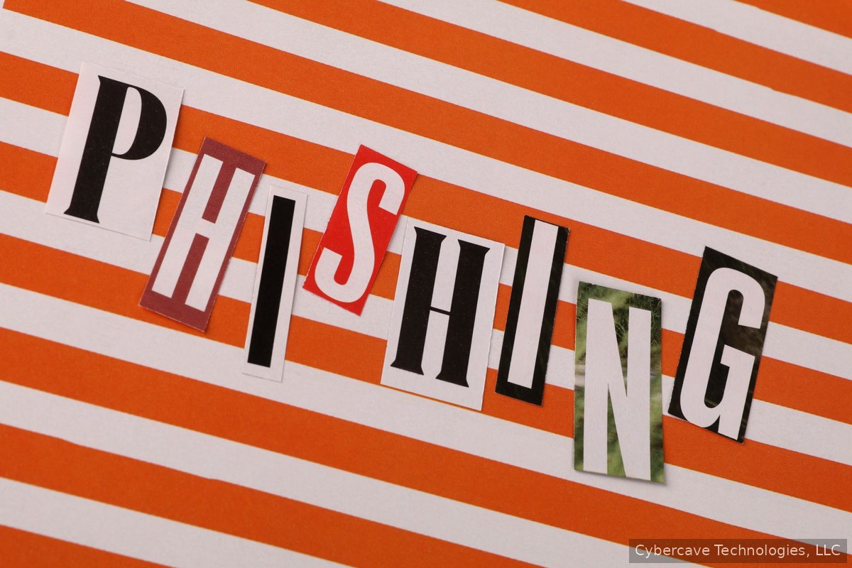 The word PHISHING spelled in cut-out letters on an orange-striped background
