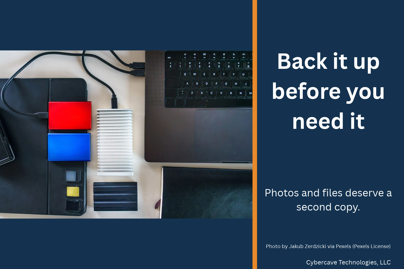 Portable drives next to a laptop